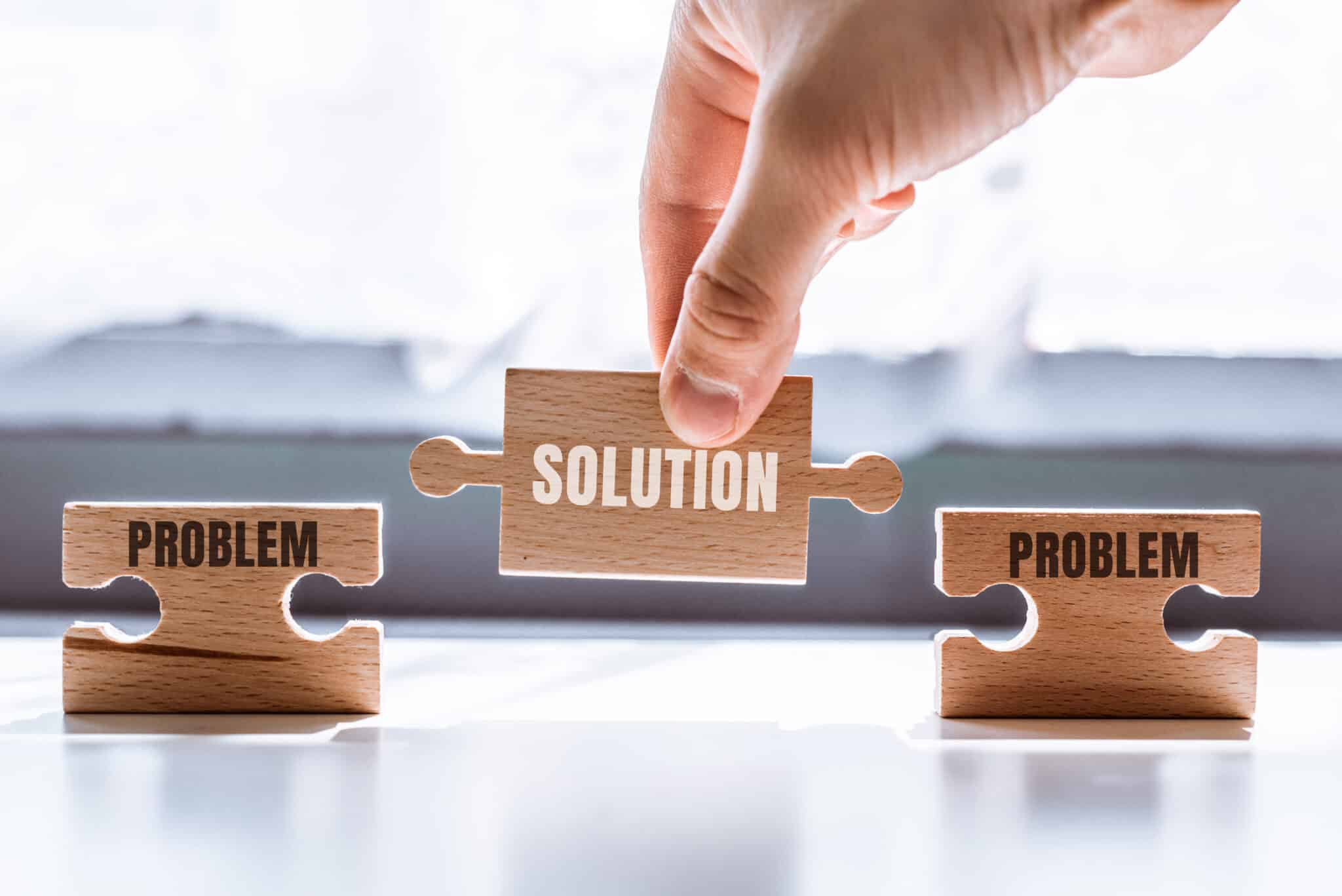 Two blocks with problems. Solution block in between.
